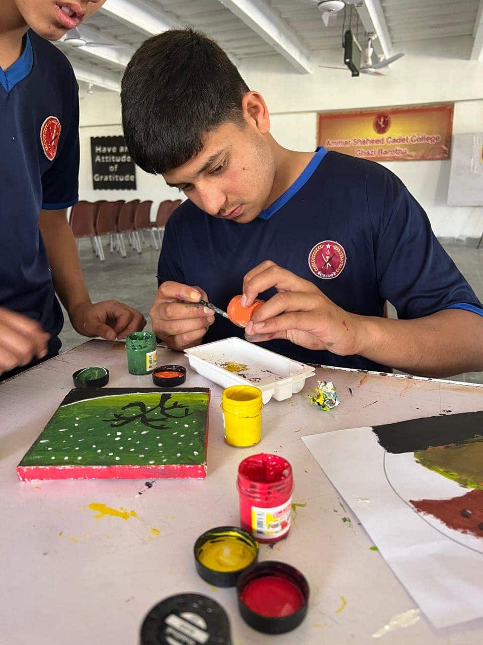 Cadets engaged in campus activities and student life at ASCC